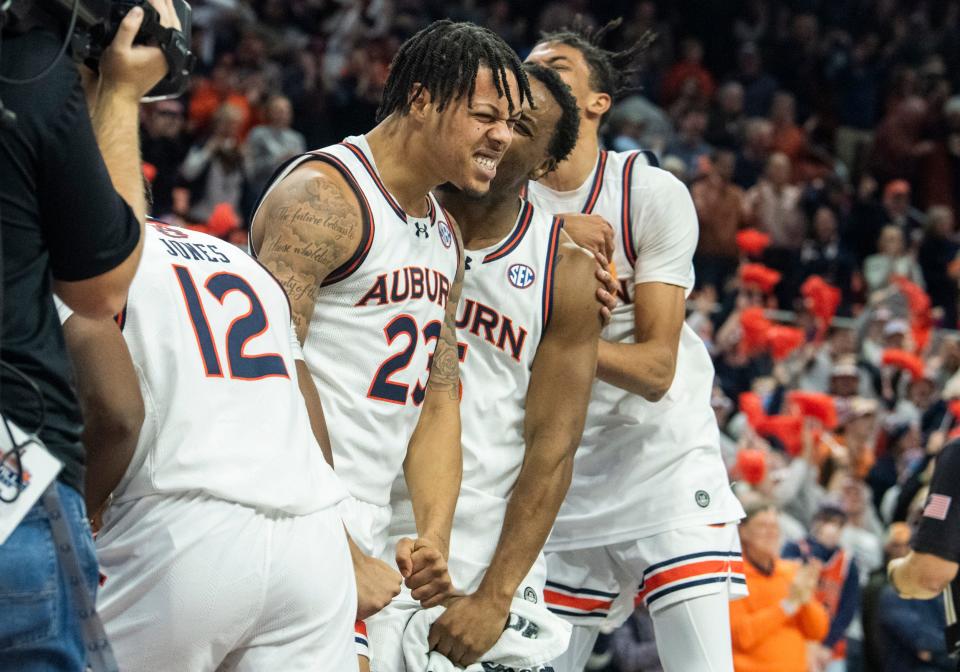 Auburn Tigers forward Addarin Scott (23) celebrates after the game as Auburn Tigers takes on Ole Miss Rebels at Neville Arena in Auburn, Ala., on Saturday, Jan. 20, 2024. Auburn Tigers defeated Ole Miss Rebels 82-59.