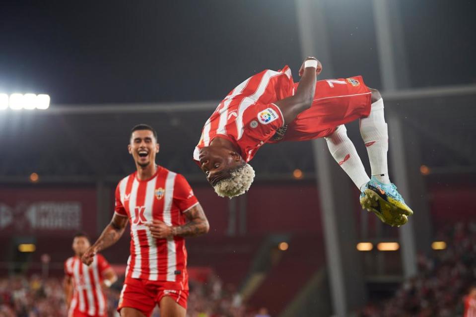 Largie Ramazani celebrates in acrobatic fashion after scoring.