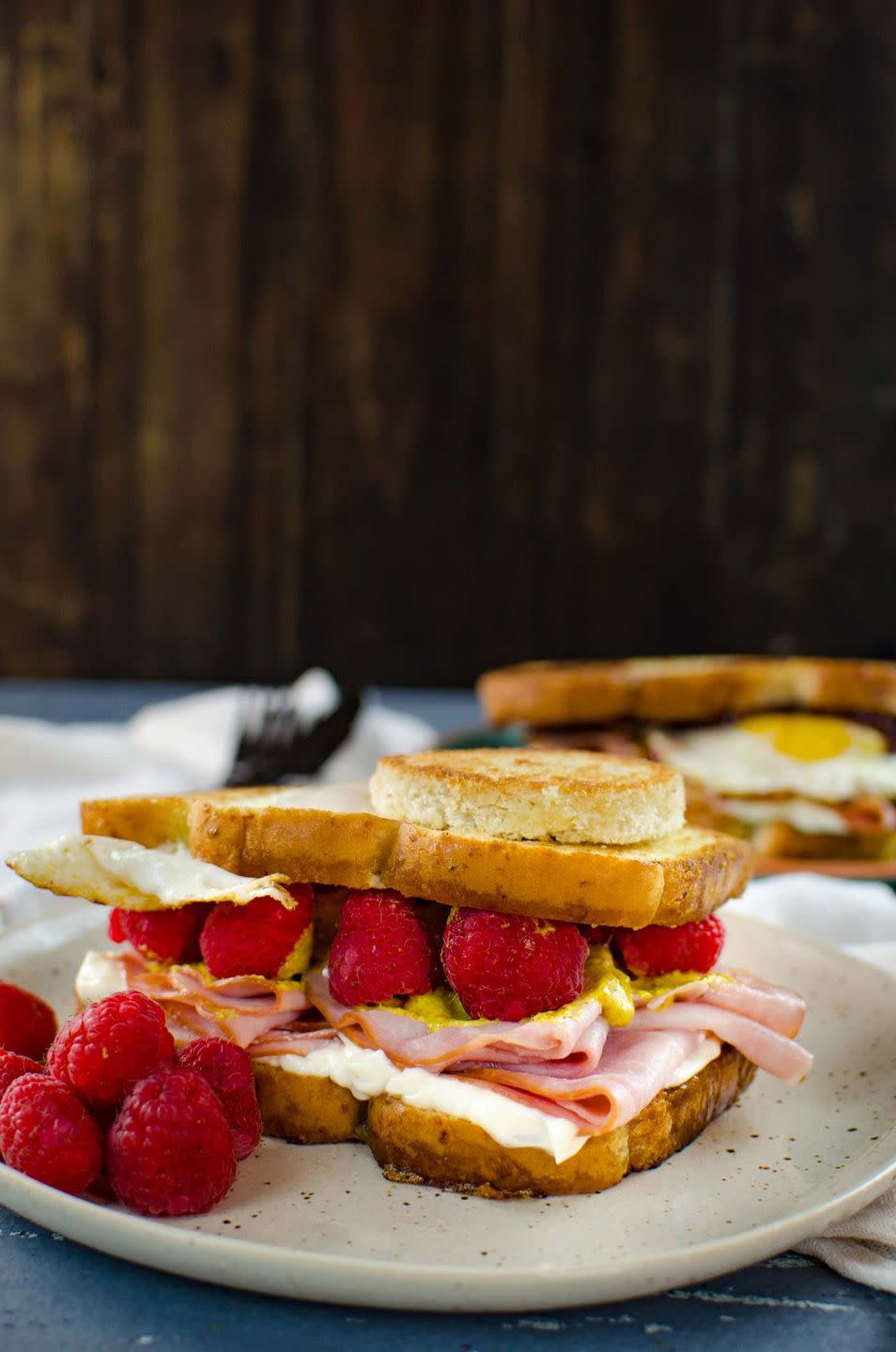 breakfast in bed raspberry ham and egg sandwich