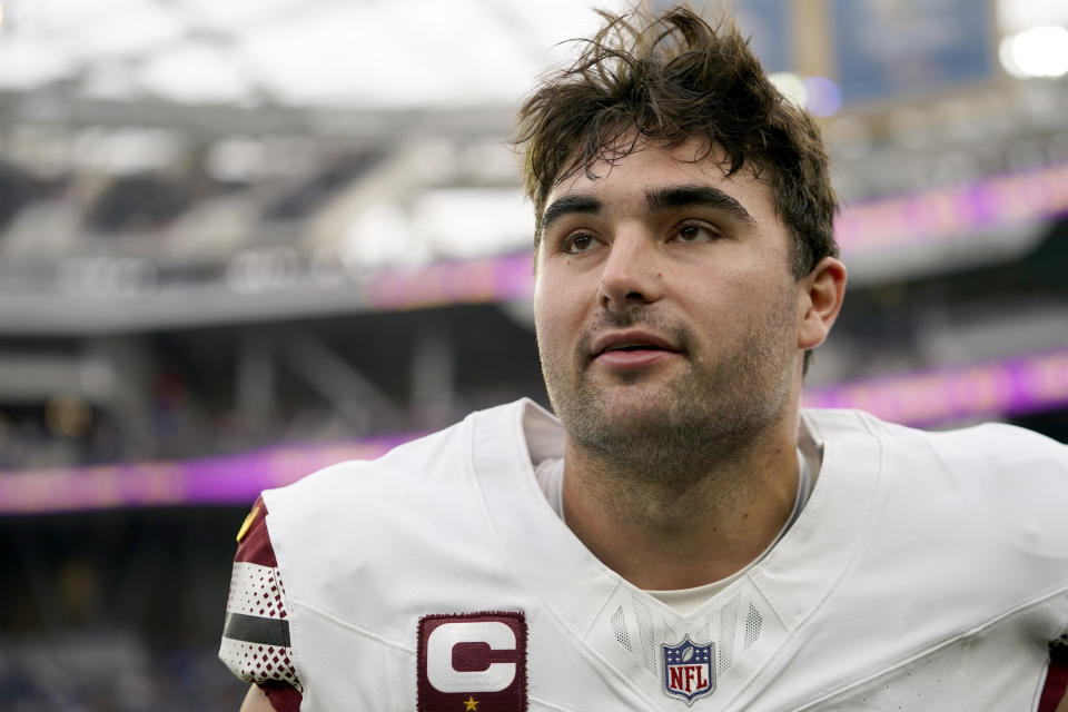 Washington Commanders quarterback Sam Howell (14) warms up before an NFL football game against the Los Angeles Rams Sunday, Dec. 17, 2023, in Los Angeles. (AP Photo/Ryan Sun)