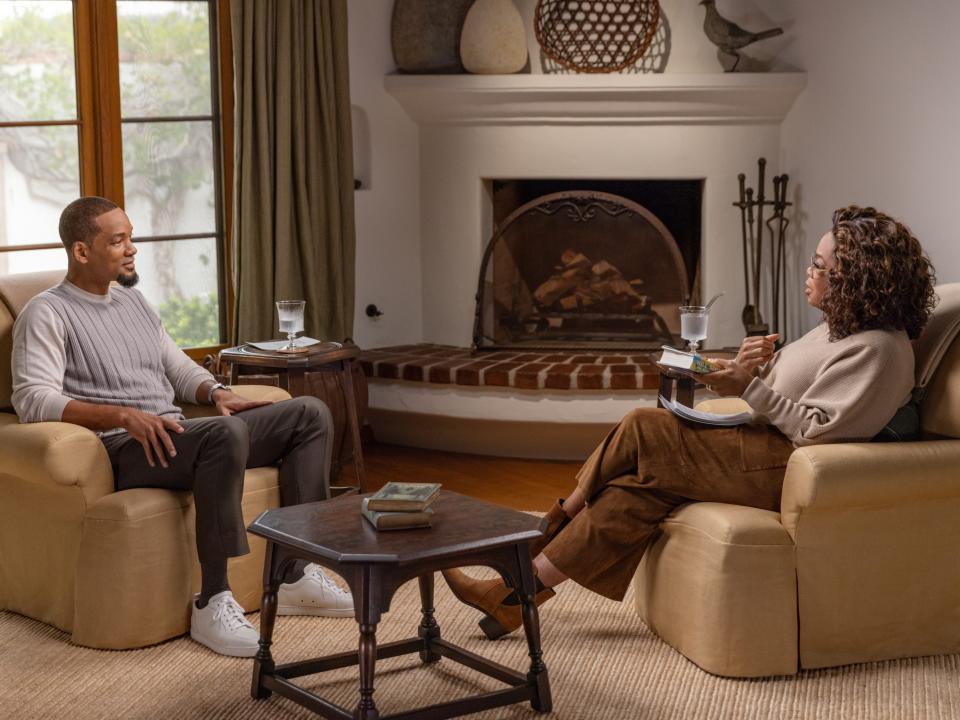 Will Smith sitting opposite Oprah Winfrey for an interview.