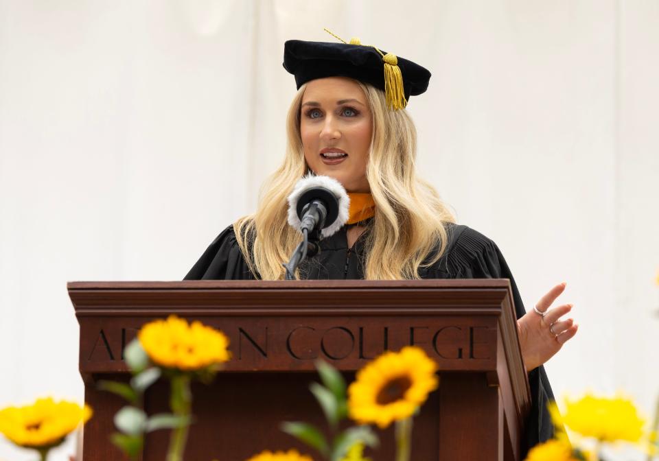 Riley Gaines, Adrian College's keynote speaker for its 2024 spring commencement ceremony on Sunday, delivers her address titled, "Daring to Speak Up: Finding Your Voice and Standing Your Ground."