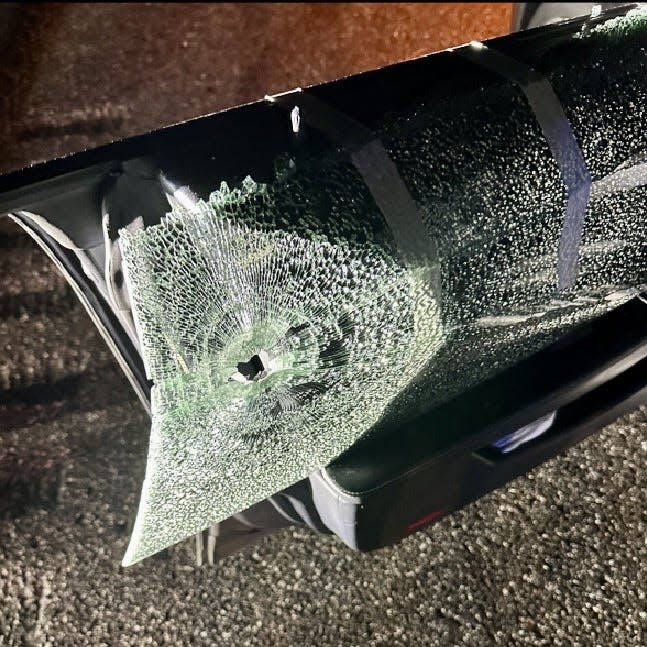 The Florida Highway Patrol said a bullet penetrated the driver's side window of this Mercedes Benz while it traveled on Interstate 4 near Deltona Wednesday night. Another vehicle shot at the car and then fled. The driver and a passenger, both from Tennessee, were injured, troopers said.