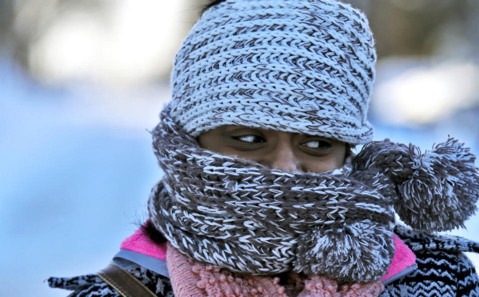 Nyjaii Williams, of St. Paul, is bundled up against the cold wind, Sunday, Jan. 26, 2014, in St. Paul. (AP Photo/The Star Tribune, Marlin Levison) MANDATORY CREDIT; ST. PAUL PIONEER PRESS OUT; MAGS OUT; TWIN CITIES TV OUT