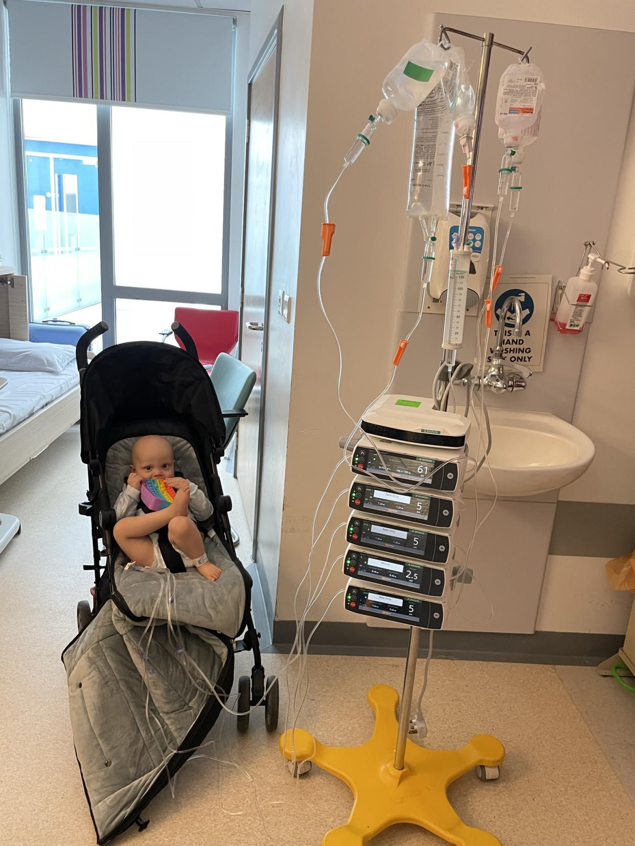 Jaxon pictured receiving treatment in hospital. (Hayley Barnes/SWNS)