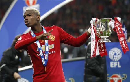 Britain Soccer Football - Southampton v Manchester United - EFL Cup Final - Wembley Stadium - 26/2/17 Manchester United's Paul Pogba celebrates with the trophy Action Images via Reuters / Carl Recine