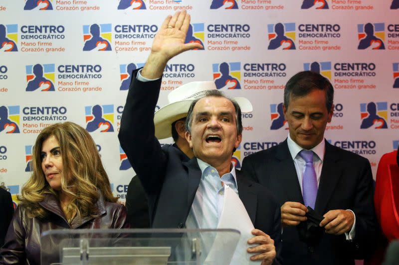 FILE PHOTO: Colombia's Centro Democratico party presidential candidate Oscar Ivan Zuluaga reacts after winning party's internal consultation, in Bogota