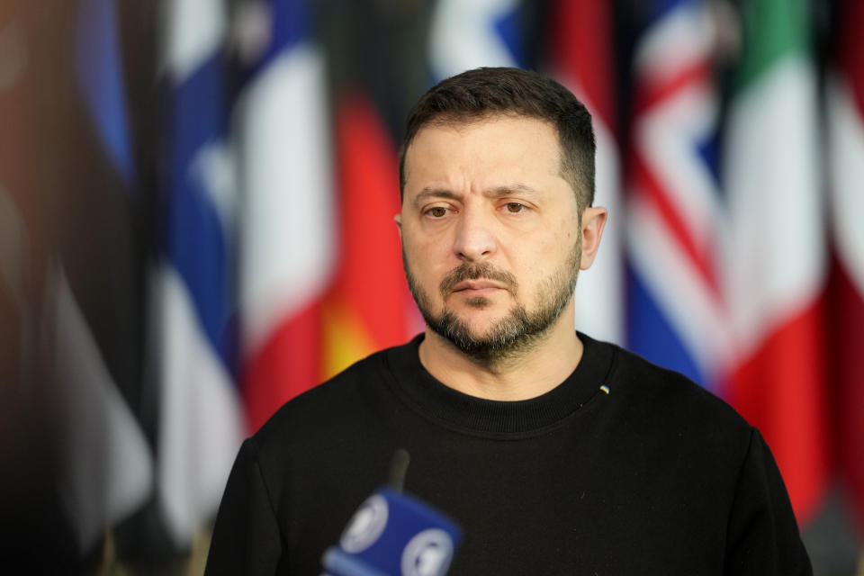 FILE - Ukraine's President Volodymyr Zelenskyy addresses a media conference prior to a meeting of NATO defense ministers at NATO headquarters in Brussels, Wednesday, Oct. 11, 2023. On Friday, Oct. 13, The Associated Press reported on stories circulating online incorrectly claiming a video shows a BBC News report confirming Ukraine provided weapons to Hamas. (AP Photo/Virginia Mayo, File)