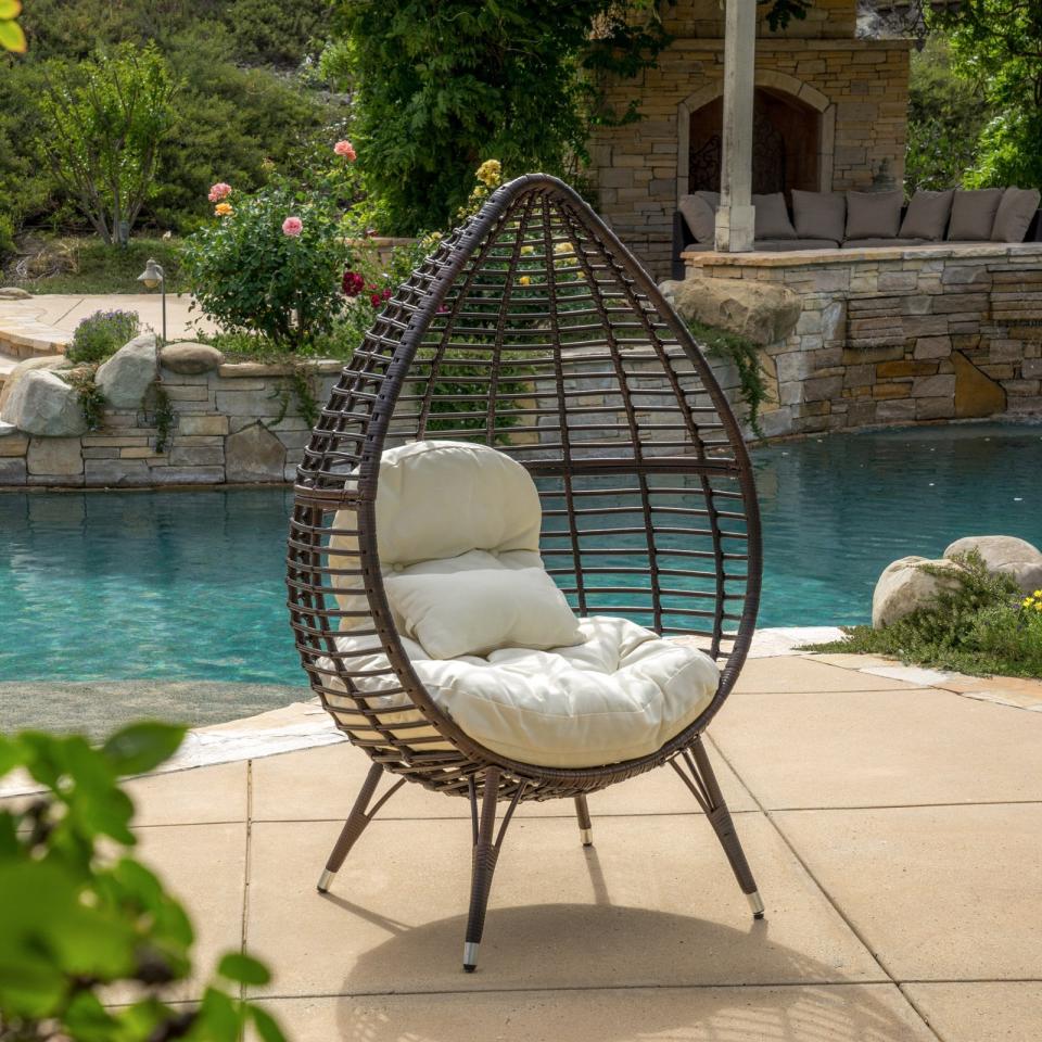 <p>An egg chair is a statement, and it's also the perfect place to curl up with a good book. Bring comfort outside your back door with this <span>Montecito Lounge Chair With Cushion</span> ($410).</p>