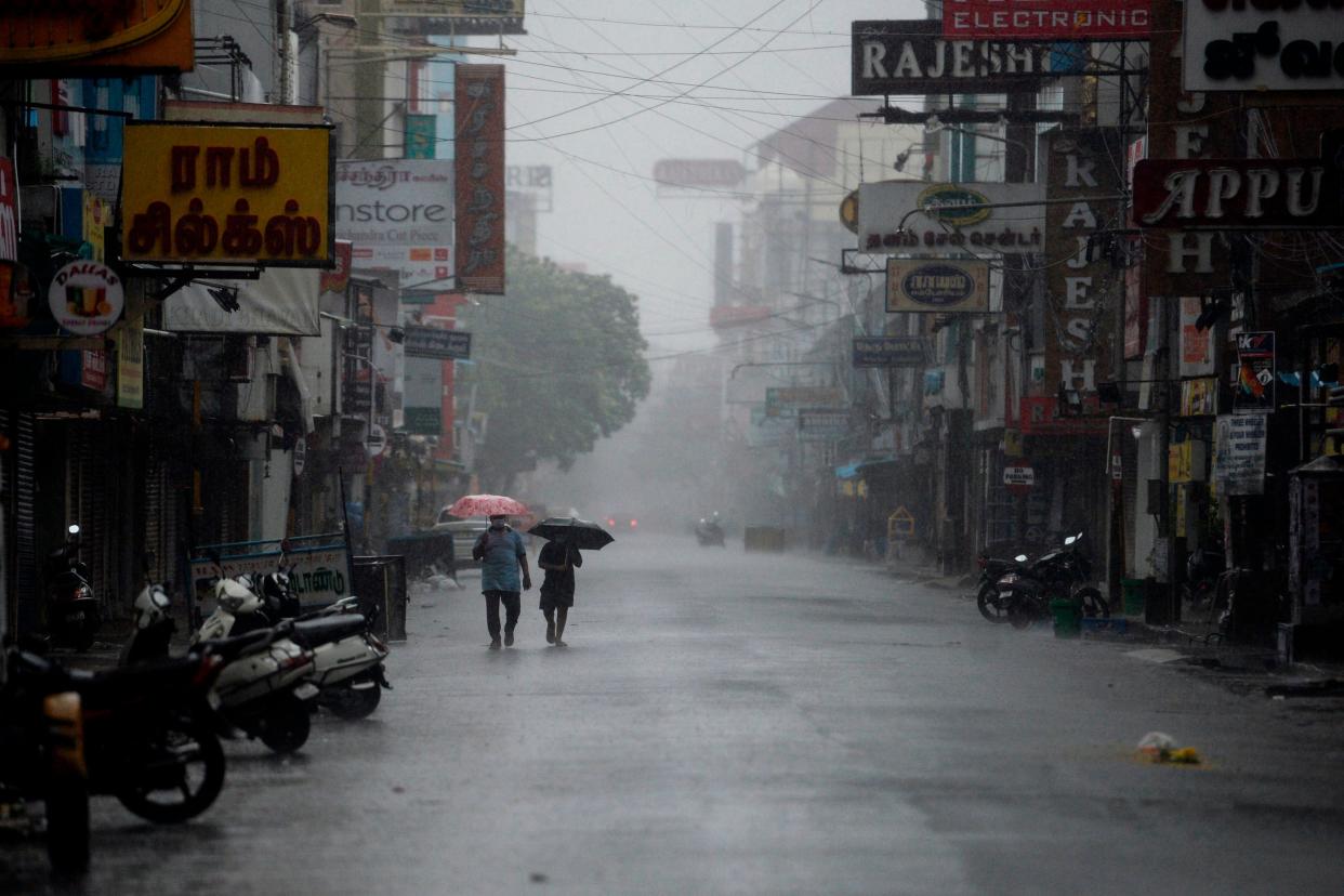 <p>Heavy rains lash southern coastal areas of India as Cyclone Nivar makes landfall</p> (AFP via Getty Images)