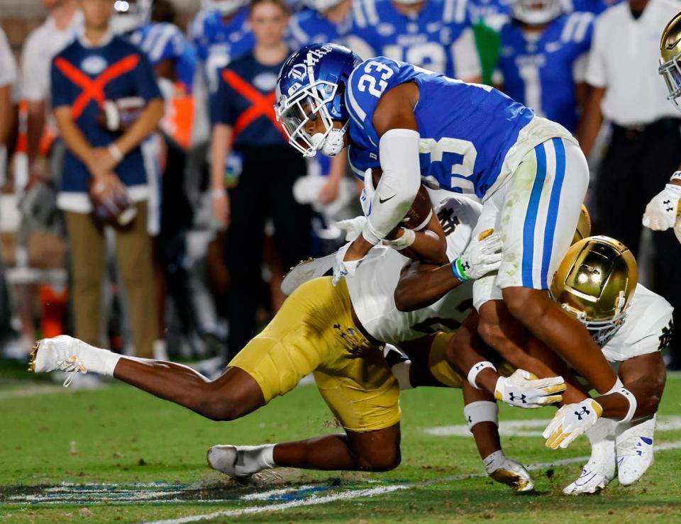 Duke’s Terry Moore is brought down by the Notre Dame defense during the first half of the Blue Devils’ game at Wallace Wade Stadium on Saturday, Sept. 30, 2023, in Durham, N.C. Kaitlin McKeown/kmckeown@newsobserver.com