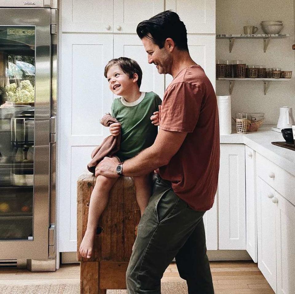 <p>The interior designer and his son Oskar, 3, look adorable in this shot from their kitchen. </p> <p>"The happiest home. Thankful everyday," Jeremiah Brent, Berkus's husband of seven years — with whom he shares Oskar and daughter Poppy, 6 — captioned <a href="https://www.instagram.com/p/CTum65RrDNY/" rel="nofollow noopener" target="_blank" data-ylk="slk:this photo.;elm:context_link;itc:0;sec:content-canvas" class="link ">this photo.</a></p>