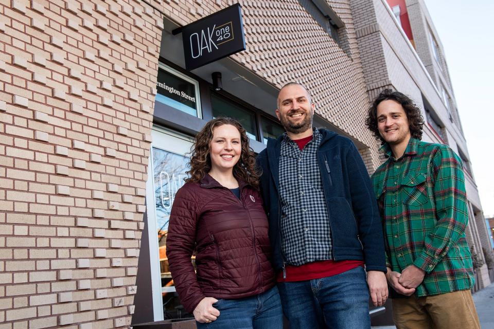 Kate Conley, Peter Erickson and Chris Conway are pictured outside the Oak 140 affordable housing development by Housing Catalyst and the Downtown Development Authority. Erickson attended public meetings to support the project in 2020 as it went through the review process.