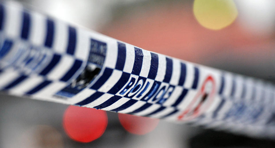 A man has been charged with stealing from a Sydney home after another man fell from the unit’s balcony and impaled himself on a table leg. Image: AAP