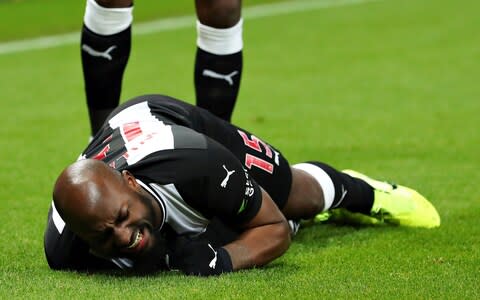 Jetro Willems of Newcastle United reacts to an injury during the Premier League match between Newcastle United and Chelsea - Credit: GETTY IMAGES