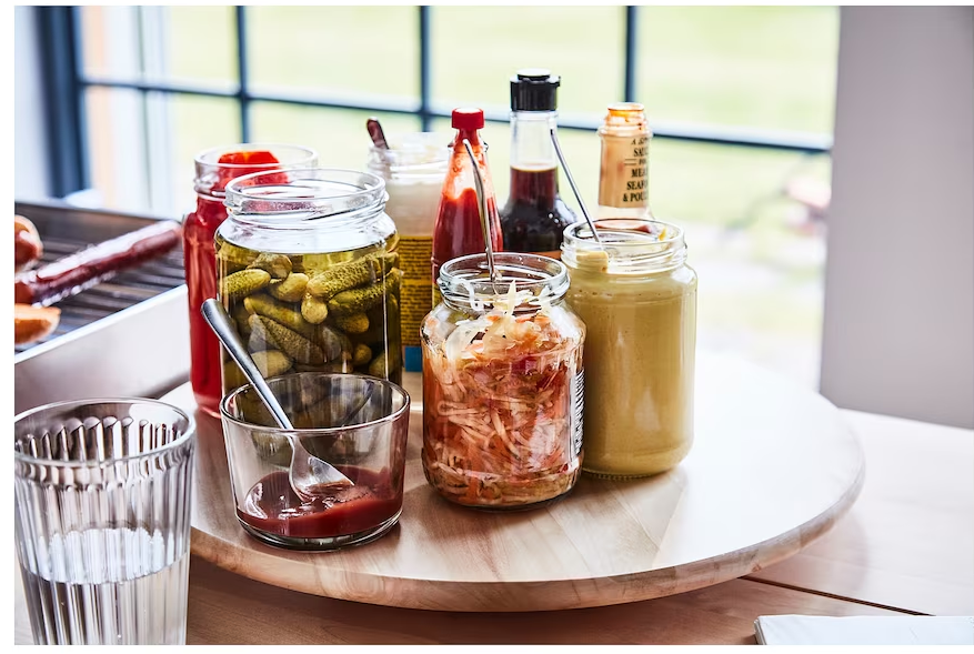 An IKEA lazy susan holding jars and condiments