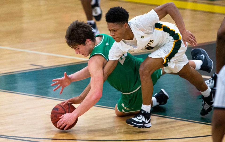 Myers Park’s Drake Maye steals the ball from Independence’s Tachai Miller during a game at Independence High School in Charlotte, NC on Friday, January 17, 2020. Joshua Komer/The Charlotte Observer