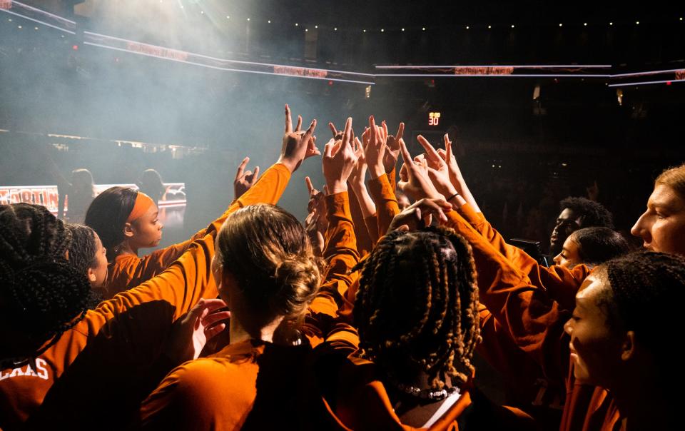 Texas players gather ahead of the Nov. 8 game against Southern. The Longhorns are 7-0 and will host Oral Roberts on Wednesday and then UConn on Sunday.