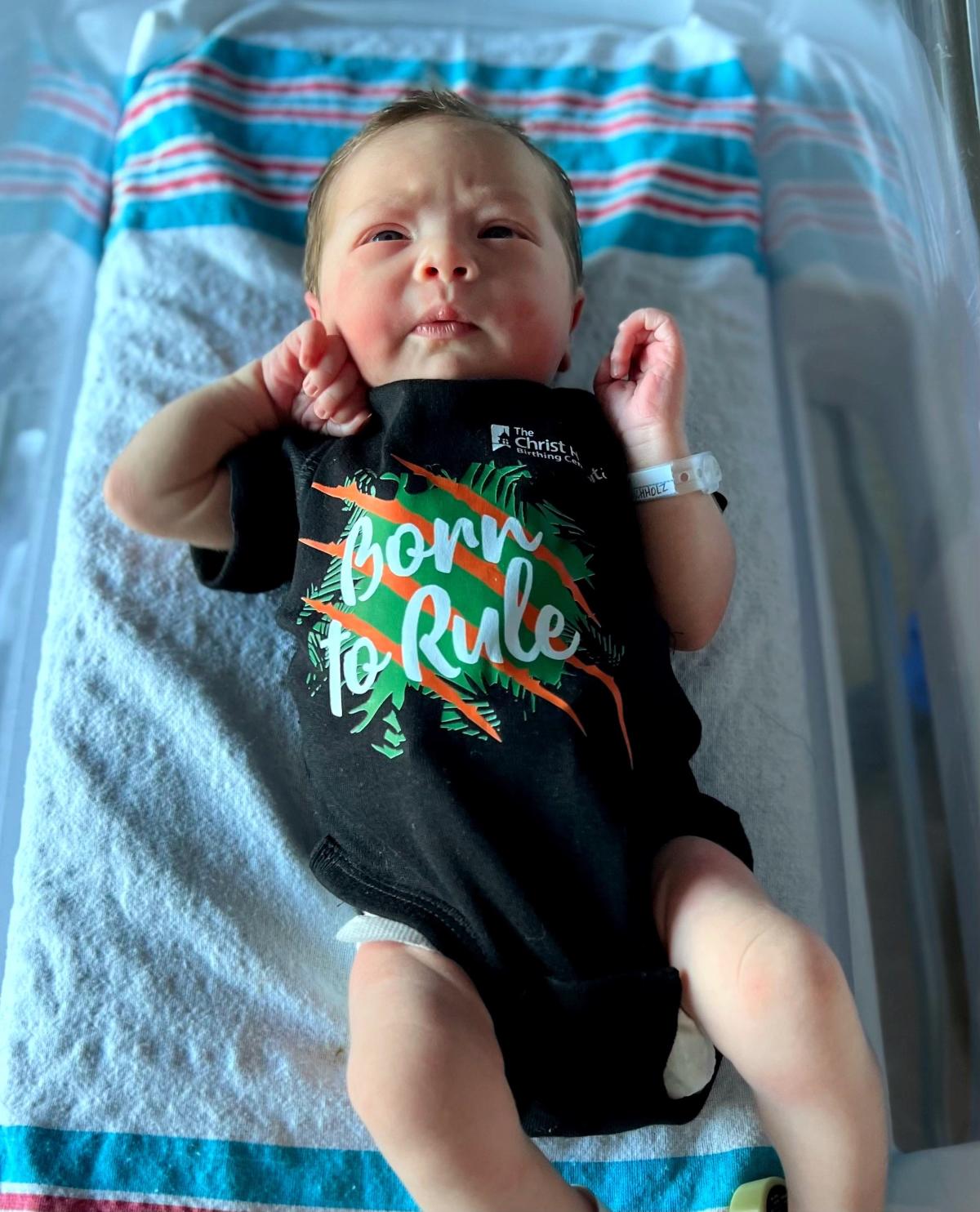 Newborns at Christ Hospital given football draft pick onesies