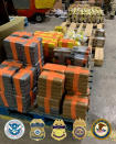 FILE - This March 2020 photo provided by the U.S. Border Patrol shows drugs seized from a tunnel under the Otay Mesa area of San Diego, Calif. Federal authorities seized a panoply of narcotics inside the newly discovered underground passage connecting a warehouse in Tijuana, Mexico, with south San Diego. The bust of $30 million worth of street drugs was also notable for its low amount of fentanyl - about 2 pounds. (U.S. Border Patrol via AP)