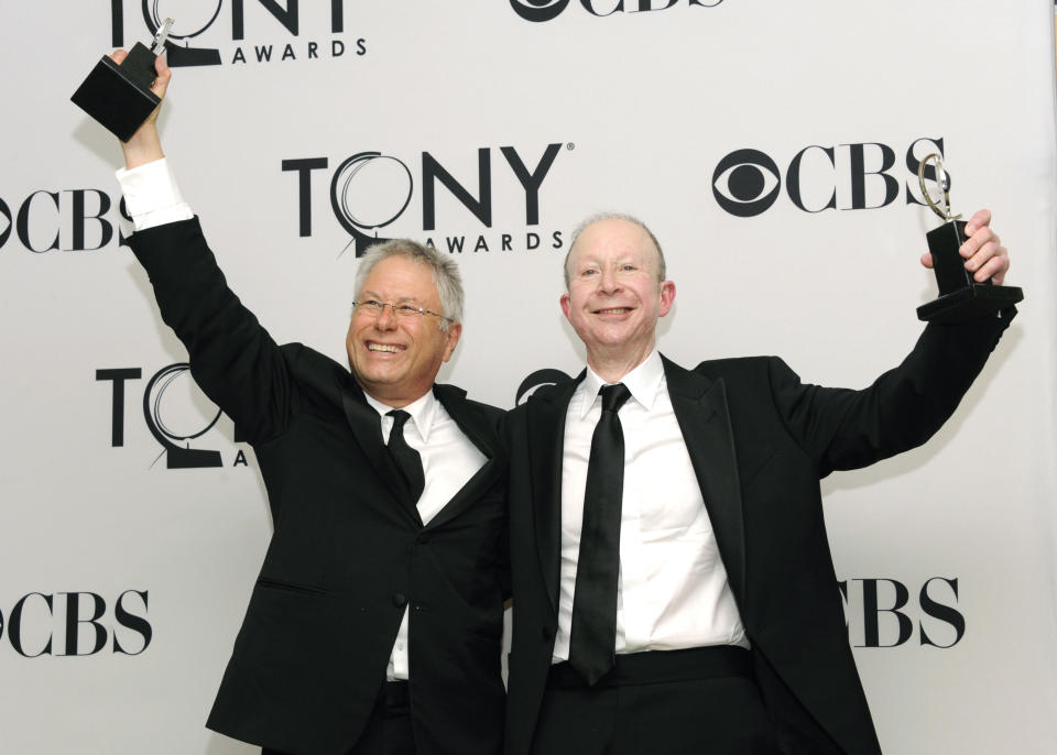 FILE - This June 10, 2012 file photo shows Composers Alan Menken, left, and Jeff Feldman in the press room at the 66th Annual Tony Awards in New York. Menken and Feldman are nominated for a Grammy Award for best theater album for the Broadway musical "Newsies." (Photo by Evan Agostini/Invision/AP, file)