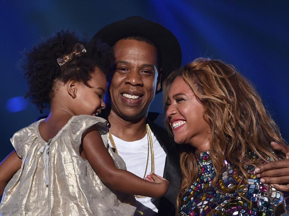 Blue Ivy, Jay-Z, and Beyoncé on stage together in 2014.