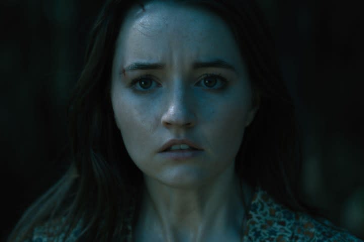 Kaitlyn Dever looks forward nervously in No One Will Save You.