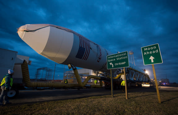 An Orbital Sciences Corp. Antares rocket is seen as it is rolled out to launch Pad-0A at NASA's Wallops Flight Facility, Sunday, Jan. 5, 2014 for a planned Jan. 8 launch from Wallops Island, Va. The Antares will launch a Cygnus spacecraft on a