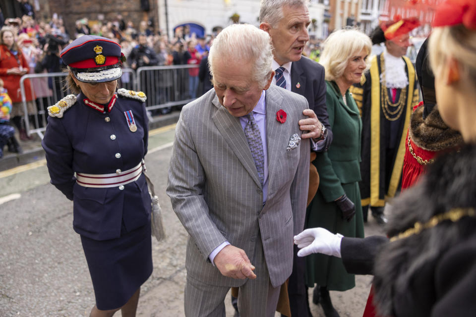 Britain's King Charles III reacts after an egg was thrown in his direction during a ceremony at Micklegate Bar in York, northern England on November 9, 2022 as part of a two-day tour of Yorkshire. - Micklegate Bar is considered to be the most important of York's gateways and has acted as the focus for various important events. It is the place The Sovereign traditionally arrives when entering the city. (Photo by James Glossop / POOL / AFP) (Photo by JAMES GLOSSOP/POOL/AFP via Getty Images)