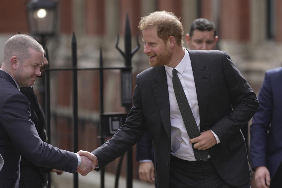 Britain's Prince Harry arrives at the Royal Courts Of Justice, in London, Thursday, March 30, 2023. Prince Harry has blamed the royal family for a delay in bringing his phone hacking lawsuit against the publisher of The Daily Mail. The publisher argued in a London court Wednesday that the Duke of Sussex, Elton John and other celebrities waited too long to sue. (AP Photo/Kin Cheung)