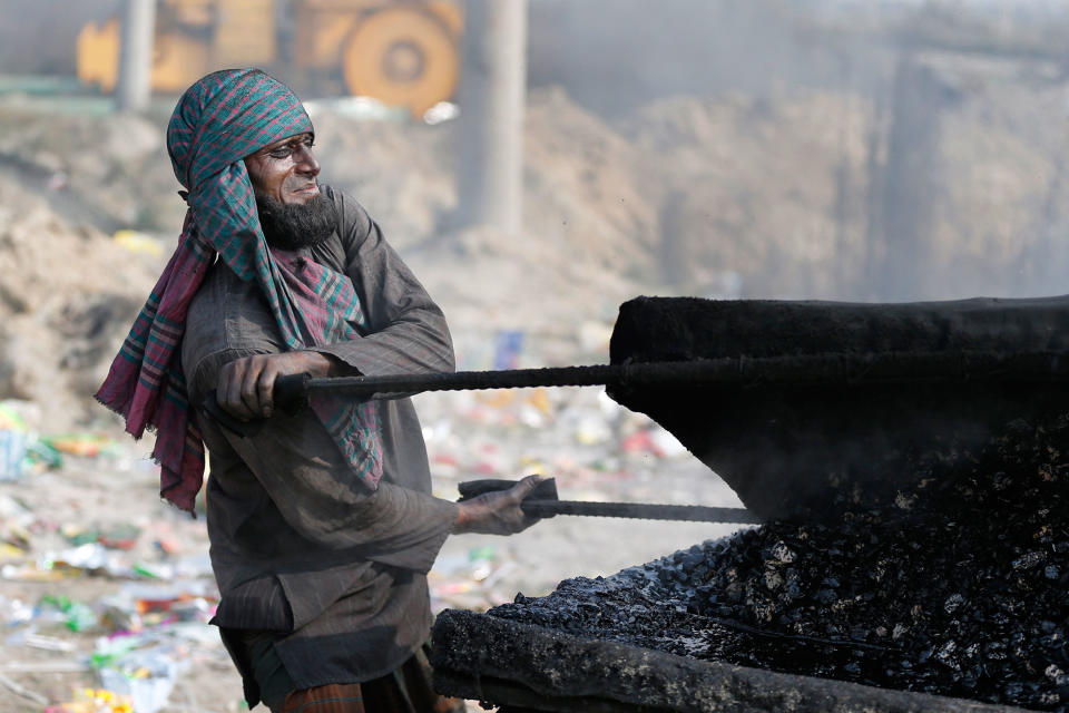 A Bangladeshi laborer works in Dhaka