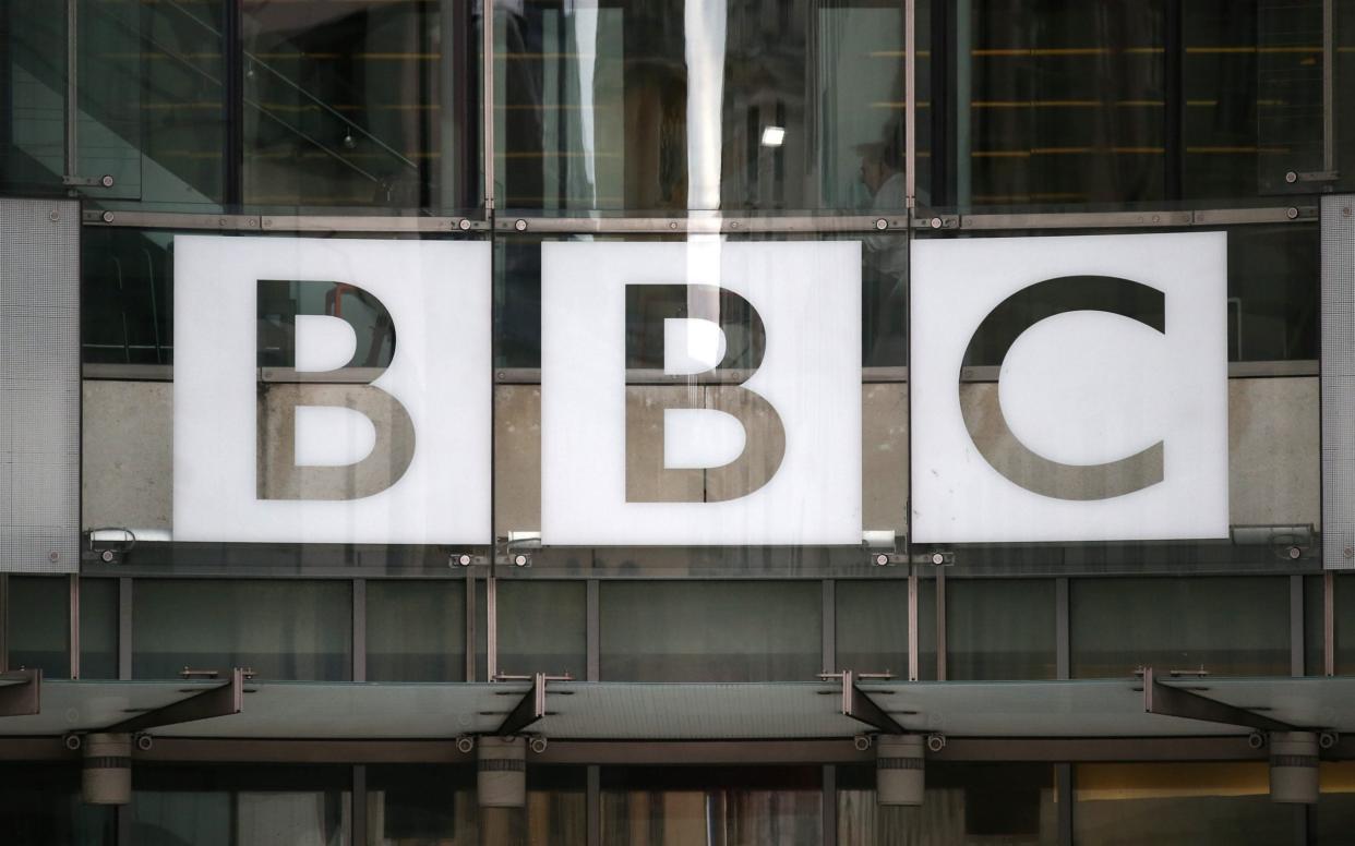 A BBC sign is displayed outside Broadcasting House in London - Reuters