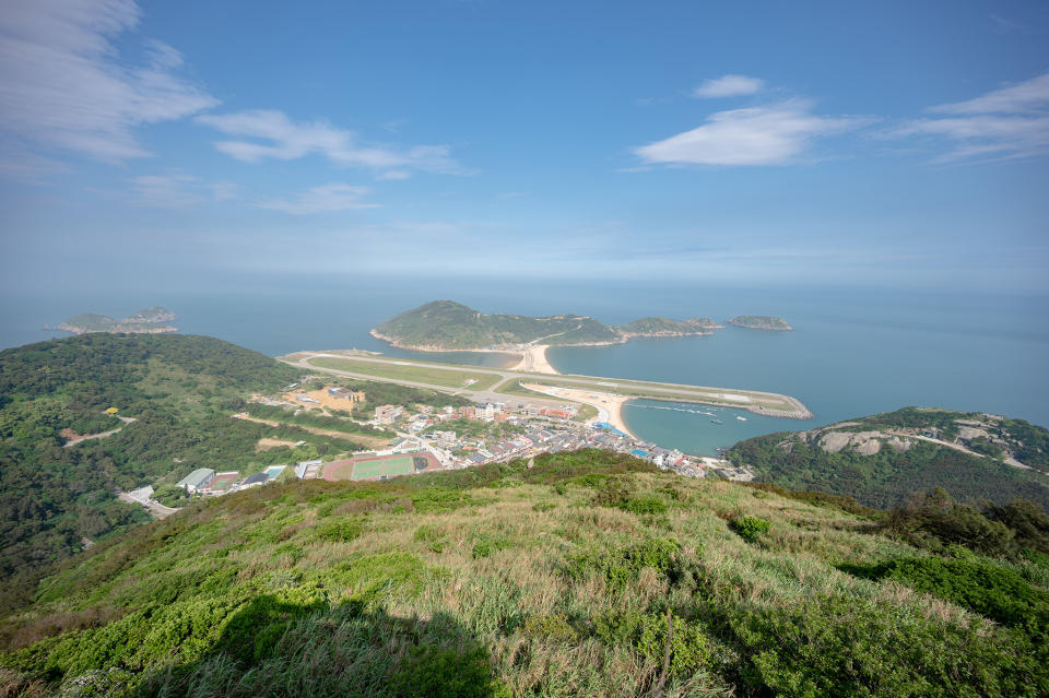 站在北高最高的「璧山觀景台」欣賞絕美遼闊的海島景色。(攝影/Sean Lin)