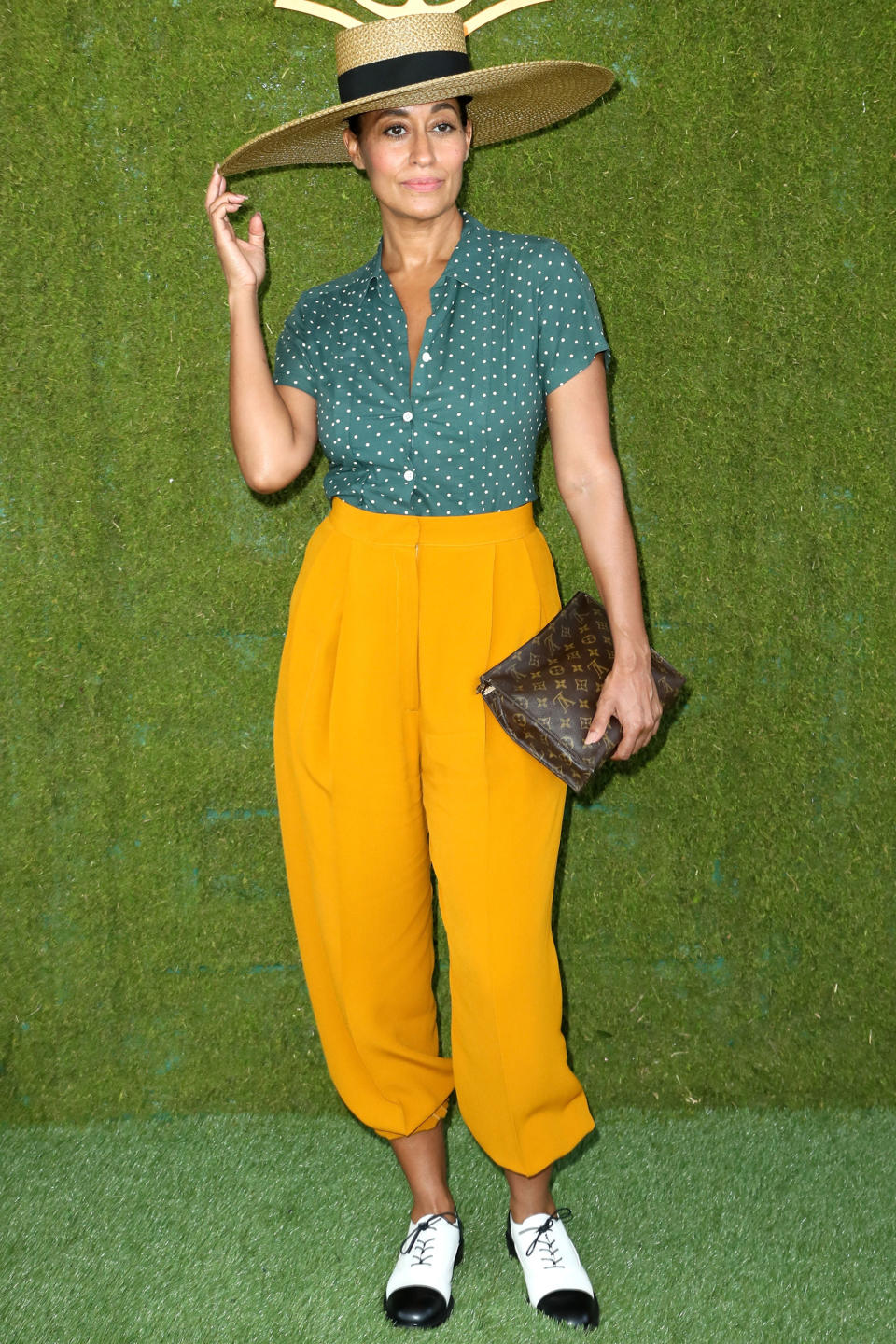 <p><strong>14 October </strong>Tracee Ellis Ross paired marigold balloon-trousers with a green polka-dot top, monochrome shoes, a Louis Vuitton clutch and a wide-brimmed hat for the event.</p>