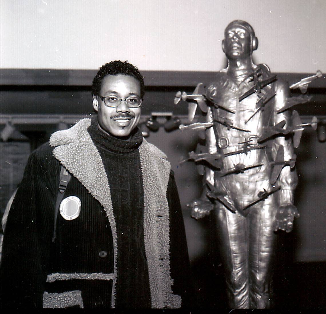 Michael Richards with his work, ‘Tar Baby vs. St. Sebastian,’ 1999. The exhibit of Richards’ work at N.C. Museum of Art, ‘Michael Richards: Are You Down?’ runs through July 23.