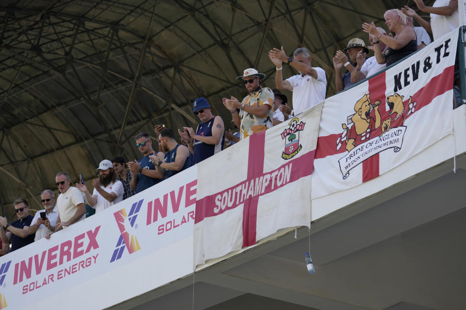 English fans cheer for their team on the end of the first test cricket match between Pakistan and England, in Multan, Pakistan, Friday, Oct. 11, 2024. (AP Photo/Anjum Naveed)