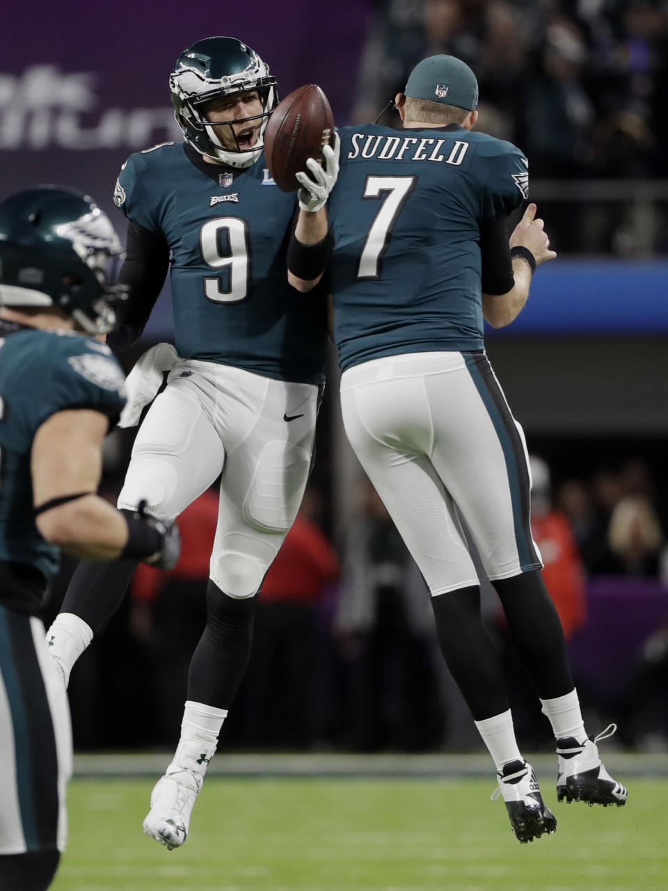 <p>Philadelphia Eagles quarterback Nick Foles (9) celebrates a touchdown with quarterback Nate Sudfeld (7), during the first half of the NFL Super Bowl 52 football game against the New England Patriots, Sunday, Feb. 4, 2018, in Minneapolis. (AP Photo/Chris O’Meara) </p>