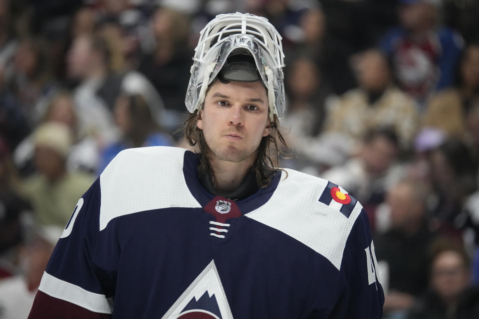 Colorado Avalanche goaltender Alexandar Georgiev waits for play to resume during the second period of the team's NHL hockey game against the St. Louis Blues on Saturday, Nov. 11, 2023, in Denver. (AP Photo/David Zalubowski)