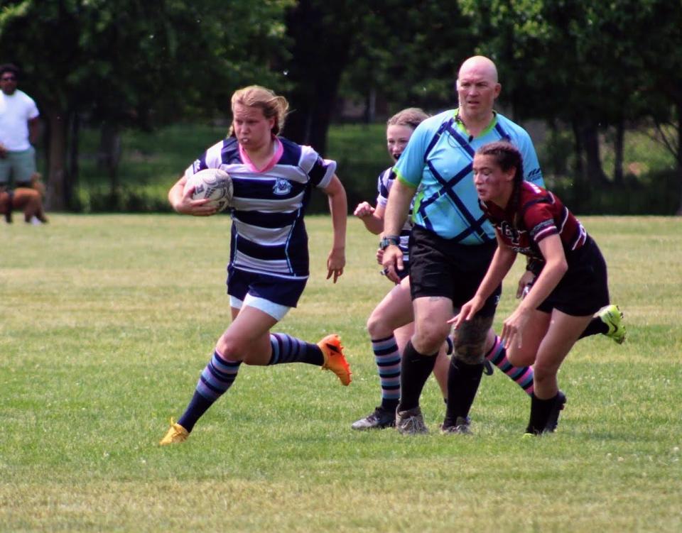 Kendra Close of the Corning Rugby Club runs with the ball in a 22-20 win over Orchard Park in the state final June 4, 2023 at Tim Russert Park in Buffalo.