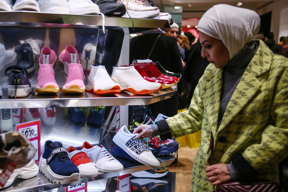 LONDON, ENGLAND - DECEMBER 26: Shoppers look for bargains during the Boxing Day Sales at Selfridges on December 26, 2019 in London, England. (Photo by Hollie Adams/Getty Images)