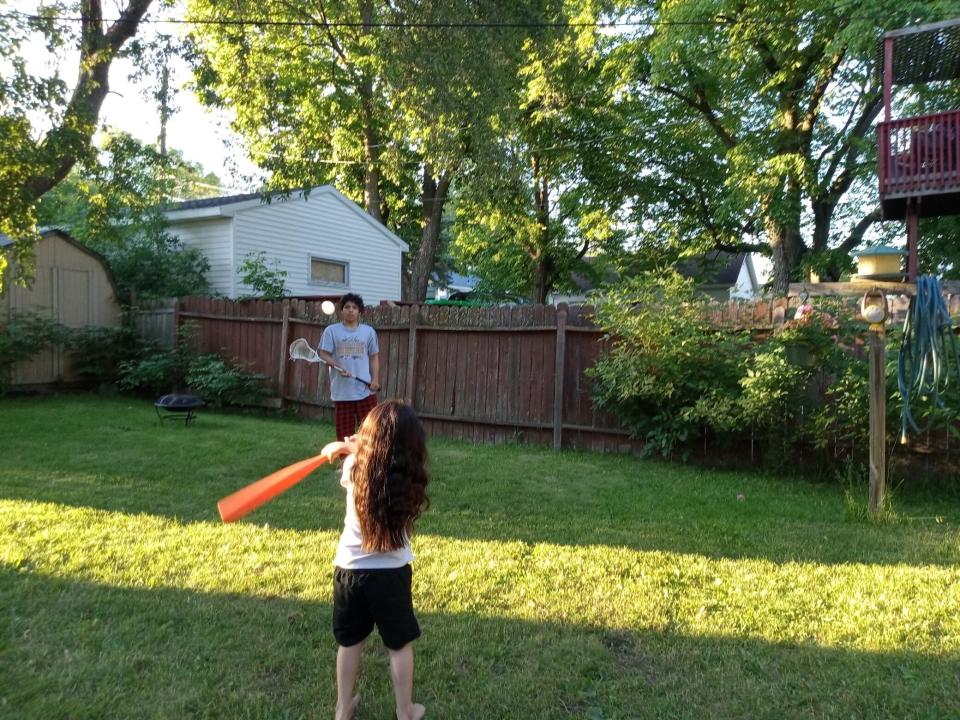 Melisa Gomez-Romo's children in their backyard.