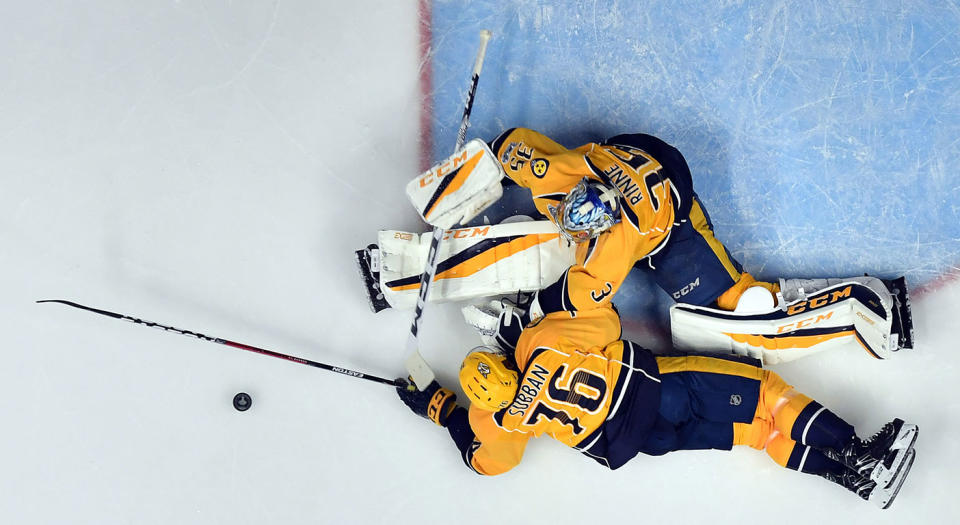 <p>Pekka Rinne came up with a number of big stops for the Predators, none bigger than this sprawling save in the second period. (Christopher Hanewinckel-USA TODAY Sports) </p>