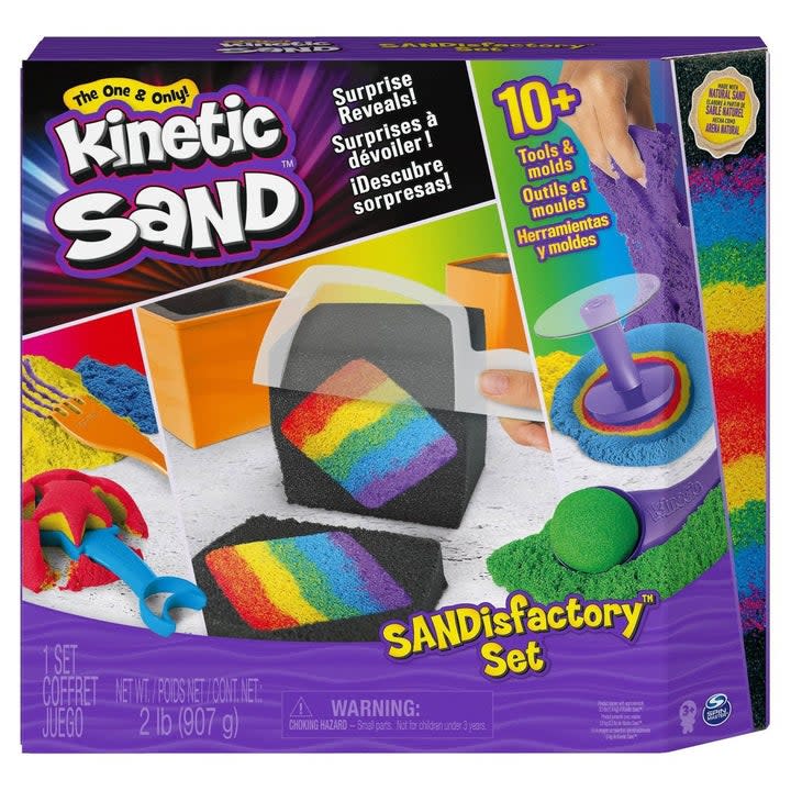 A box of rainbow Kinetic Sand