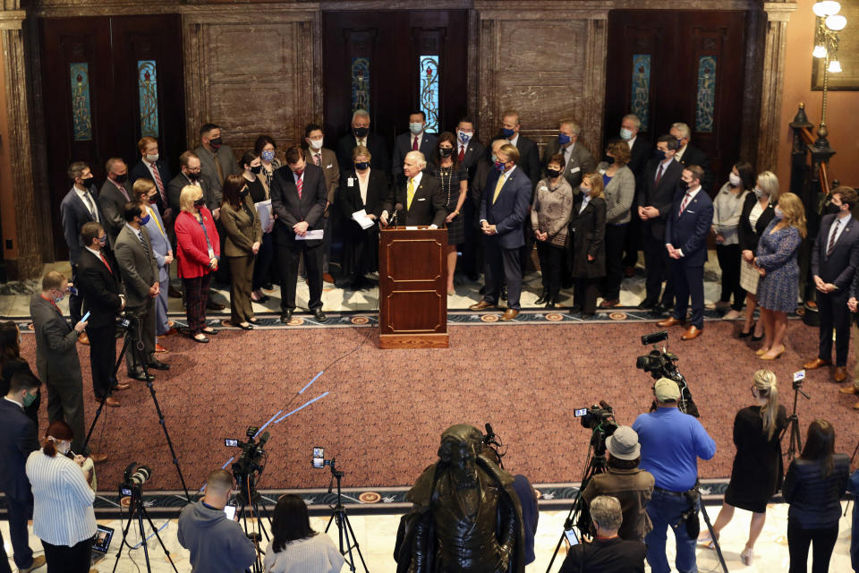 South Carolina Gov. Henry McMaster, center, speaks at a news conference to celebrate the likelihood of a bill banning almost all abortions passing and getting to his desk after a news conference on Wednesday, Jan. 27, 2021, in Columbia S.C. The Senate passed the bill on an initial vote. (AP Photo/Jeffrey Collins).