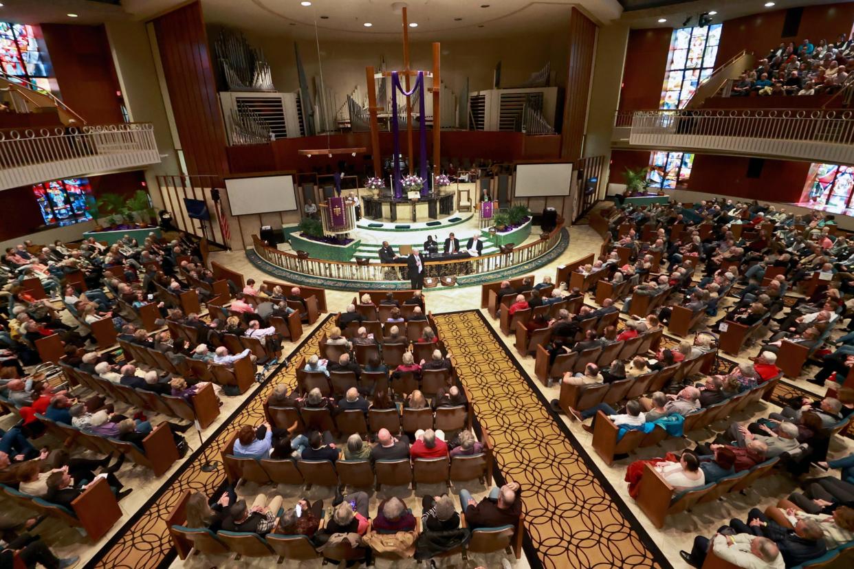 Members of St. Luke's United Methodist Church vote to disaffiliate from the United Methodist denomination during a congregational gathering in March 2023 at 222 NW 15.