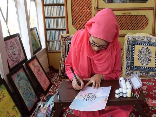 Budding Calligrapher from South Kashmir takes father's legacy ahead. Photo/ANI