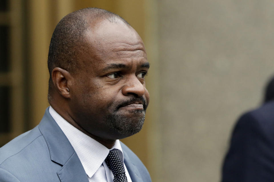 NFLPA executive director DeMaurice Smith leaves federal court following a hearing in the "Deflategate" case, Monday, Aug. 31, 2015,  in New York. Last-minute settlement talks between lawyers for NFL Commissioner Roger Goodell and New England Patriots quarterback Tom Brady have failed, leaving a judge to decide the fate of "Deflategate."(AP Photo/Mark Lennihan)