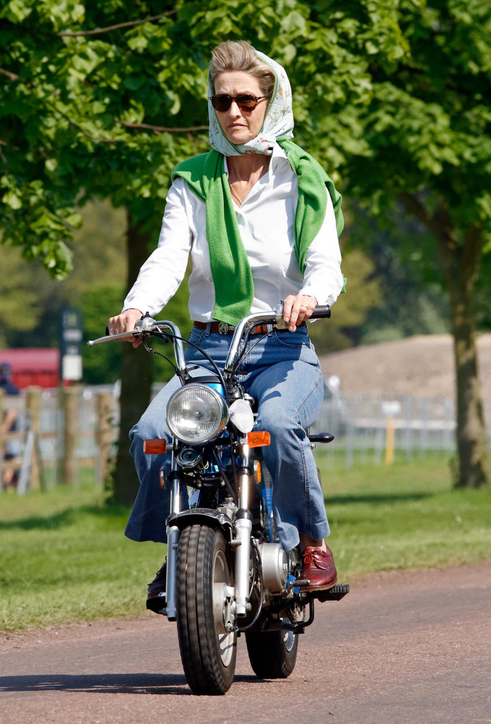 WINDSOR, UNITED KINGDOM - MAY 11: (EMBARGOED FOR PUBLICATION IN UK NEWSPAPERS UNTIL 24 HOURS AFTER CREATE DATE AND TIME) Penelope Knatchbull, Lady Brabourne seen riding a mini 'Easy-Rider' motorbike as she attends day 1 of the Royal Windsor Horse Show in Home Park on May 11, 2006 in Windsor, England. (Photo by Max Mumby/Indigo/Getty Images)