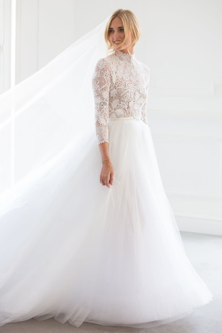 <p>Chiara Ferragni married Italian superstar Federico Leonardo Lucia (aka Fedez) in September 2018. Working with Maria Grazia Chiuri, she wore two haute couture Dior dresses. For her ceremony, Ferragni walked down the aisle in a crochet lace romper featuring long sleeves and a high neck, with a full tulle skirt over the top.</p>