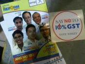 Stickers like this were given out at the Reform Party rally. (Yahoo! photo/ Fann Sim)